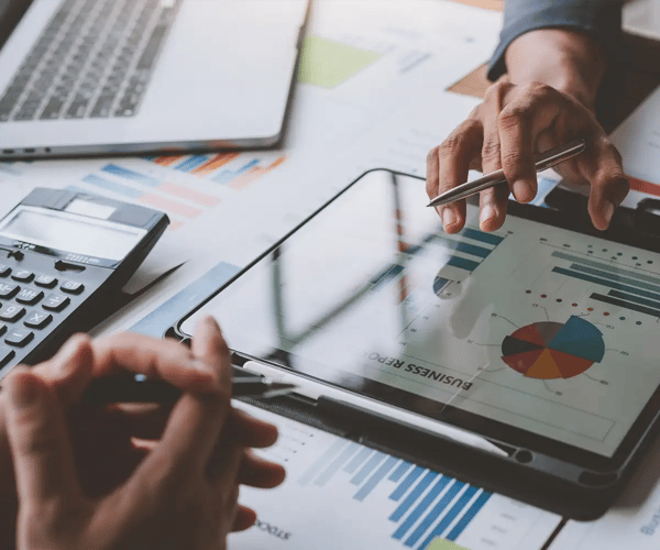 Tablet with graphs on a desk