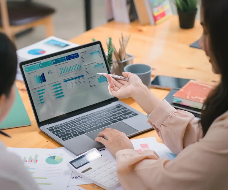 Laptop with charts and graphs