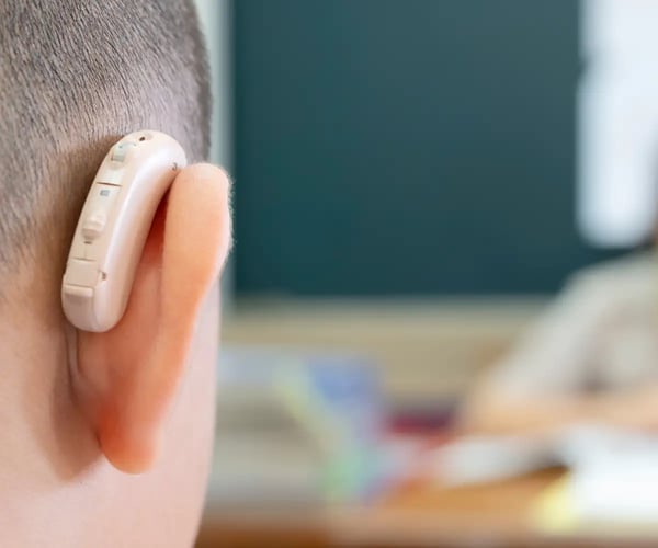 Person with hearing aid